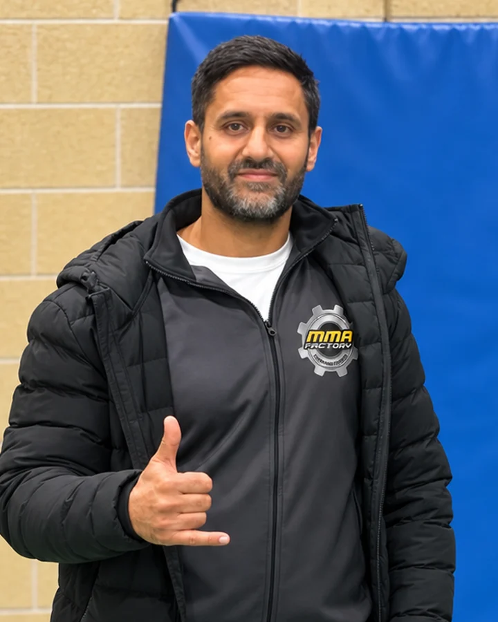 Coach Jag Paul Plaha in MMA Factory tracksuit