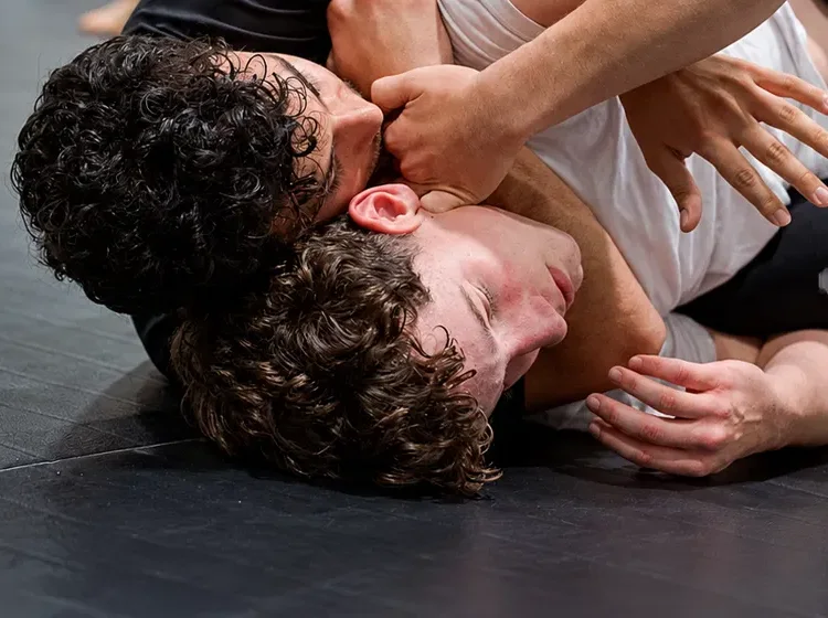 Two MMA Factory members drilling a rear naked choke in no-gi